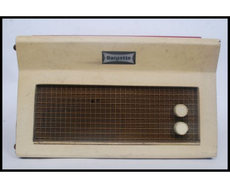 A vintage 1960's two tone red and cream cased Dansette Major De - Lux, four speed record player having a Garrard deck. Light 