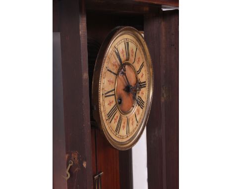 A 19th century large walnut cased vienna regulator wall clock in the manner of Gustav Becker. This large example with enamel 