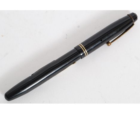 An American Vintage Parker Parkette Zephyr Fountain Pen bearing impressed marks to the stem together with a vintage mid centu