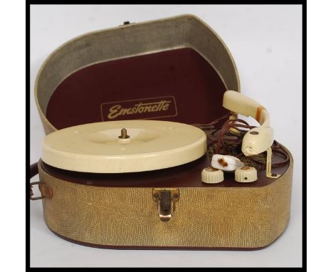 A vintage Emstonette two tone portable record player in original case with bakelite deck with BSR markings
