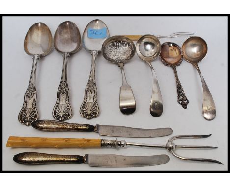 2 silver hallmarked handled Victorian knives together with large plated toasting fork, ladles, caddy spoon, serving spoons et