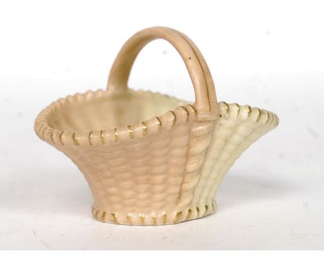 A small Royal Worcester Ivory Blush  basket of scalloped form with handle. Black mark to base 