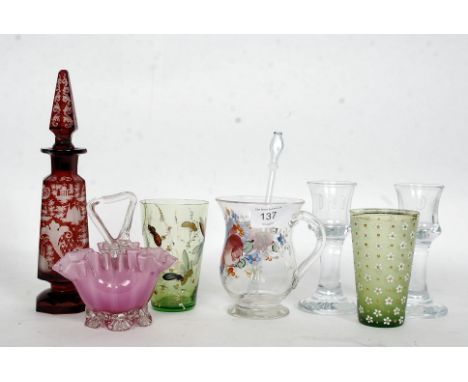 A collection of vintage glasswares to include ruby flash glass decanter, handpainted glass jug, end of day coloured glass bas
