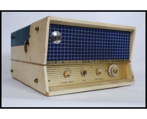 A vintage 1950's two tone Emerson Hi-Fidelity portable record player. The vinyl case blue and white with inset record deck