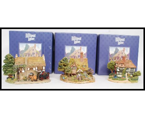 LILLIPUT LANE: A collection of Lilliput Lane ceramic cottages, each boxed to include L2082 Medway Manor, L2098 The George Inn