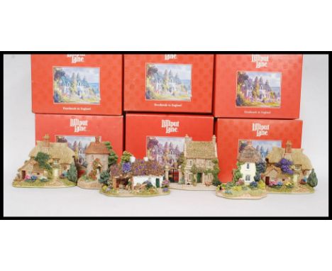 LILLIPUT LANE: A collection of 6x red boxed Lilliput Lane ceramic cottages - Cider Apple Cottage L2043 (x2), Sore Paws L2022,