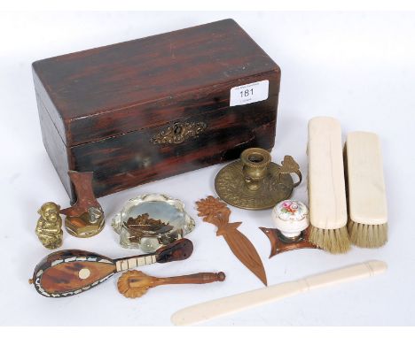 A collection of items to include a Victorian tea caddy, a tortoiseshell model mandolin, a glass paperweight and other curios