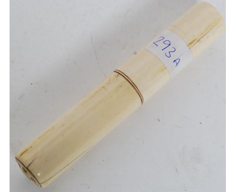 A 19th century Chinese bone  paper scroll cylindrical screw thread box with pierced ends to each side.