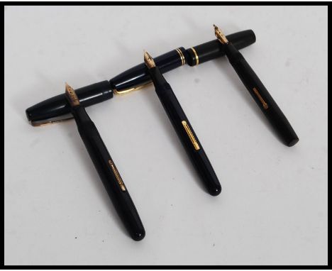 A vintage Watermans 14ct gold nib fountain pen in blue with gold trim together with a Conway Stewart 14ct gold nib fountain p