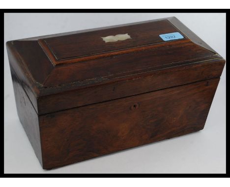 A good large 19th century rosewood sarcophagus shaped tea caddy. Rosewood with mother of pearl inlaid top