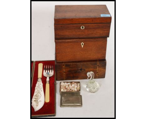 An assorted group of collectables to include three work boxes / writing slope / caddy boxes along with a cased flatware servi