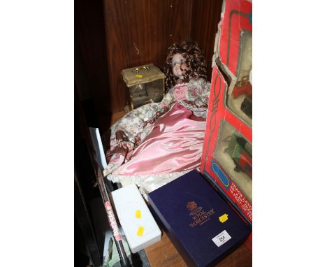 A BOXED ROYAL WORCESTER MILLENNIUM CUP AND SAUCER,  A CASED SET OF BRASS WEIGHTS, A STAIGER CARRIAGE / MANTEL CLOCK PLUS A LI