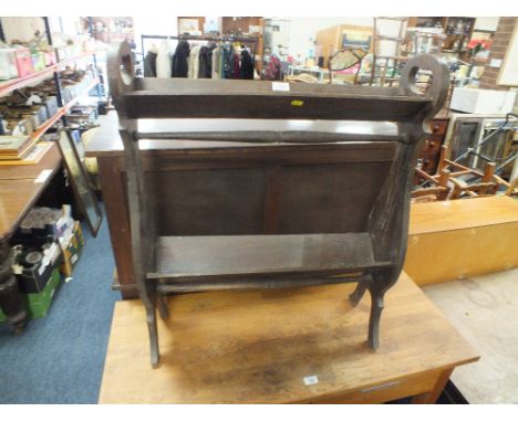 AN OAK 1920'S TWO TIER BOOK TROUGH, with cut-out handles and turned stretcher, H 81.5 cm, W 69 cm