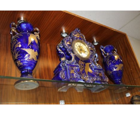 A VICTORIAN PORCELAIN TYPE CLOCK GARNITURE WITH GILT DECORATION  (3)