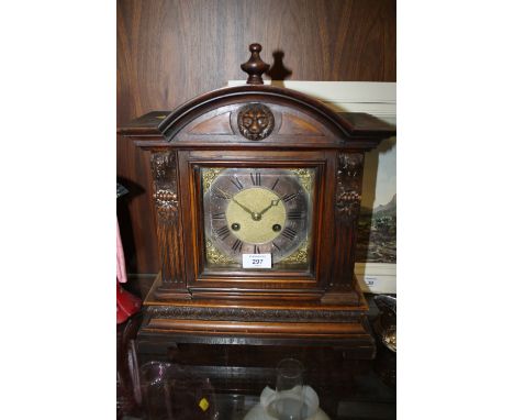 AN EDWARDIAN MAHOGANY ARCHITECTURAL STYLE MANTEL CLOCK