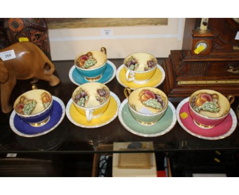 A COLLECTION OF SIX AYNSLEY CUPS AND SAUCERS WITH ORCHARD GOLD PATTERN INTERIORS 