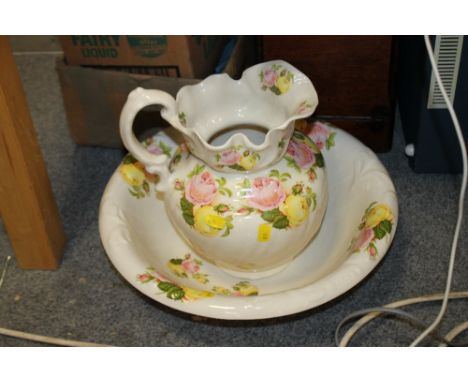 A FLORAL CERAMIC IRONSTONE WATER JUG AND BOWL
