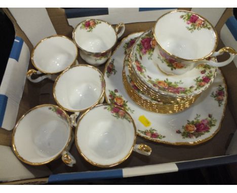A SMALL TRAY OF ROYAL ALBERT OLD COUNTRY ROSES CERAMICS TO INCLUDE CUPS, SAUCERS AND SIDE PLATES