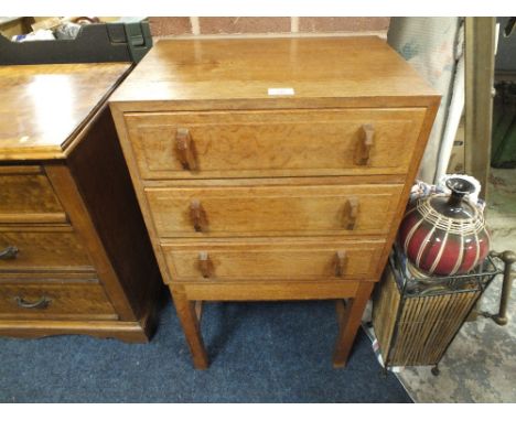 A SMALL LIGHT OAK MUSIC TYPE CHEST ON STAND W 55 CM
