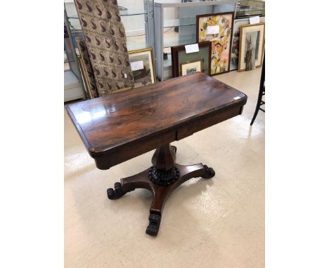 A 19th century rosewood card table