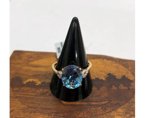 A 9ct gold large topaz dress ring