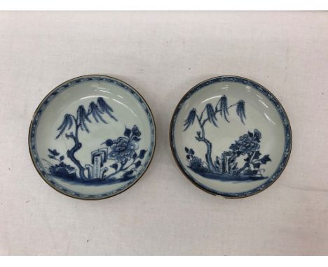 A  pair of 19th century Chinese saucers