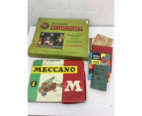 A Subbuteo Continental boxed box of Meccano; together with stamp albums