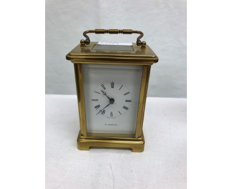 A brass carriage clock