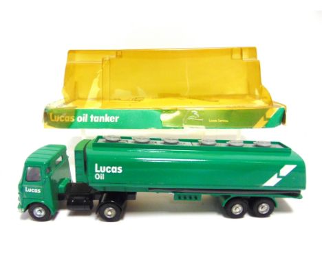 A DINKY [NO.945] PROMOTIONAL A.E.C. ARTICULATED TANKER 'LUCAS OIL' green and white, near mint, with original card plinth base