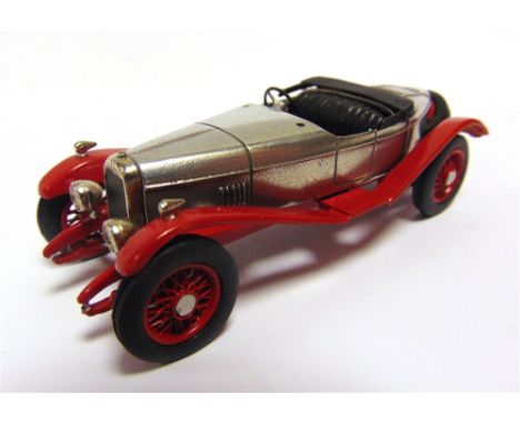 [WHITE METAL]. A 1/43 SCALE K. &amp; R. REPLICAS 1926 ALVIS 12/50 'DUCK-BACK' polished bare metal with a red chassis, general