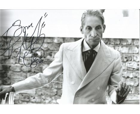 Charlie Watts signed and dedicated 10x8 black and white image. Charlie Watts was most famous for being the drummer for the gr