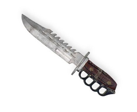 A foam dagger prop (approx 36cm) likely screen used in Judge Dredd (1995). It is believed that this is the knife used by Sylv