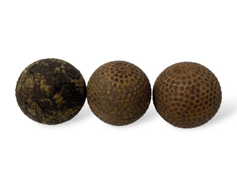 Three bramble golf balls, comprising: The Dunlop V, circa 1911; The Special, circa1910s; and one other.