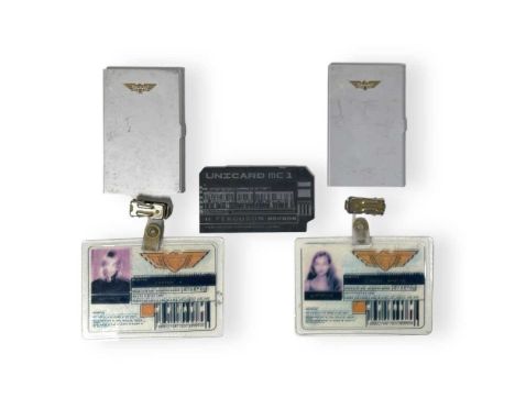Five likely screen used props from Judge Dredd (1995). To include: 'H. Ferguson' ID card, two ID card holders, two ID badges,