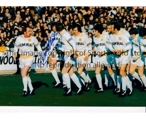 NORMAN HUNTER      Autographed 12 x 8 col photo of the 1974 First Division winners - Leeds United, parading the First Divisio