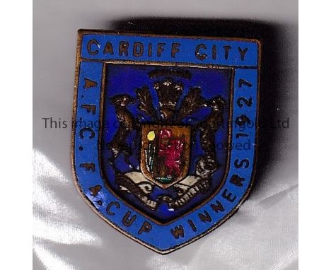 CARDIFF CITY 1927 FA CUP      An original metal lapel badge with the club badge in the middle, surround by the words "Cardiff