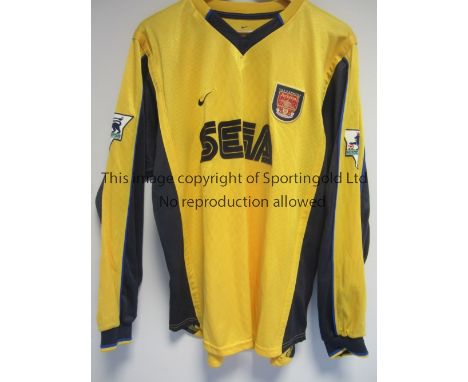 LAUREN ARSENAL PLAYER ISSUE SHIRT     A Nike yellow with blue long sleeves away shirt 1999 - 2001  with the FA Premier League
