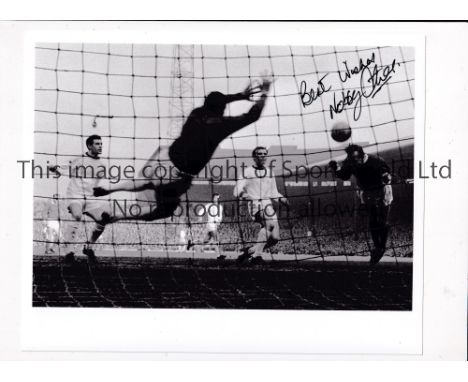 MANCHESTER UNITED / NOBBY STILES AUTOGRAPH      Signed 10" X 8" b/w photo of Stiles scoring the winning goal at home v Arsena