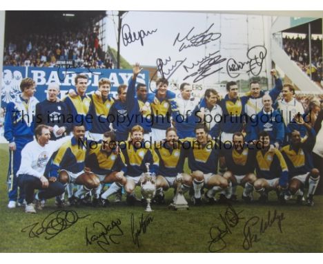 LEEDS UNITED        Autographed 16 x 12 col photo of players posing with the First Division trophy at Elland Road prior to th