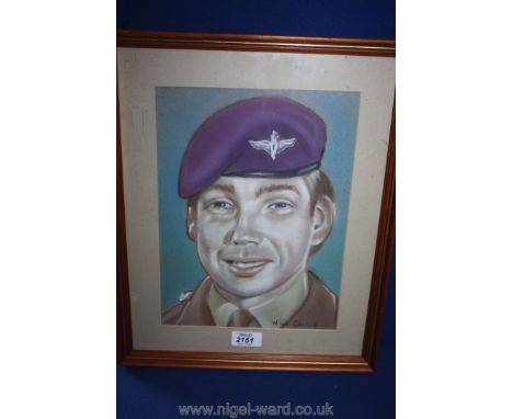 A framed and mounted colour Pastel of a young soldier, possibly a member of the Parachute Regiment, signed Mick Casson, 8 1/2