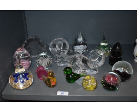 A good collection of vintage art glass paper weights including animal studies and lamp worked.