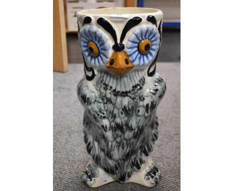 A mid century ceramic owl umbrella or stick stand hand decorated. In good condition. 44cm tall