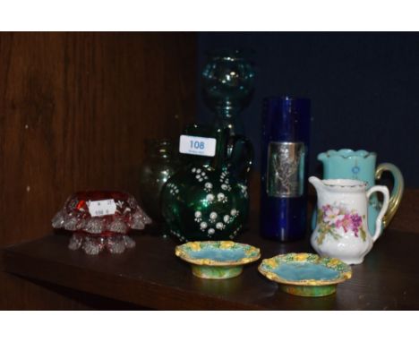 A selection of late Victorian art glass including a blue custard glass jug, Jade green and enamel jug and vase etc.