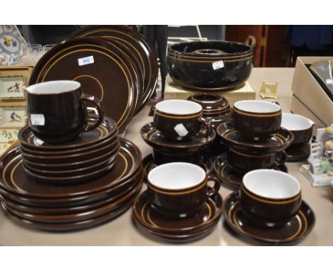 A vintage Denby brown glazed part tea and dinner service.