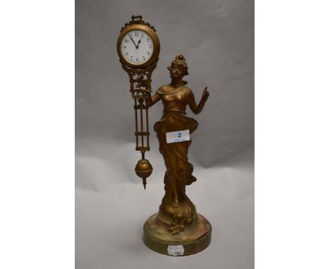 A Victorian French bronzed mystery Diana swinging arm mantel clock timepiece with Junghans movement, modelled as a standing l