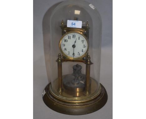 An early 20th century German made 400 day anniversary clock with glass dome.