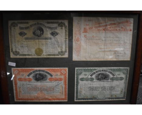 A set of four early 20th century Mining and Refinery share certificates.