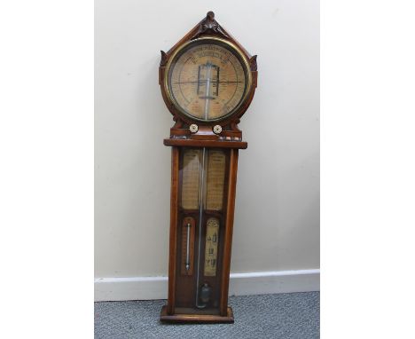 A LATE VICTORIAN OAK CASED ADMIRAL FITZROY 'ROYAL POLYTECHNIC' BAROMETER, the paper dial with seasonal scales, two mercury th