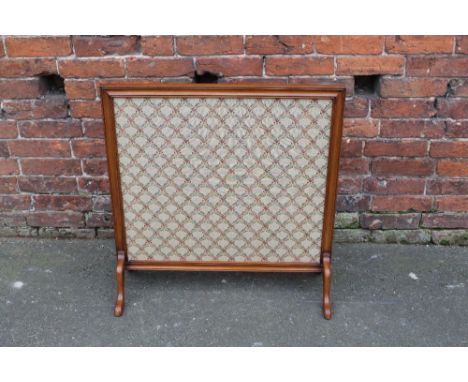 AN EARLY 20TH CENTURY MAHOGANY FRAMED FIRE SCREEN, of square form, with inset tapestry panel, raised on four feet, H 79 cm, W