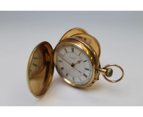 AN 18CT GOLD FULL HUNTER CENTRE SWEEP CHRONOGRAPH POCKET WATCH, signed 'M.J.Russell, London', white enamel dial with black Ro